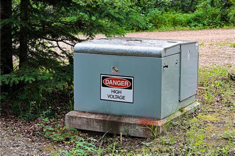 green electrical boxes dangerous